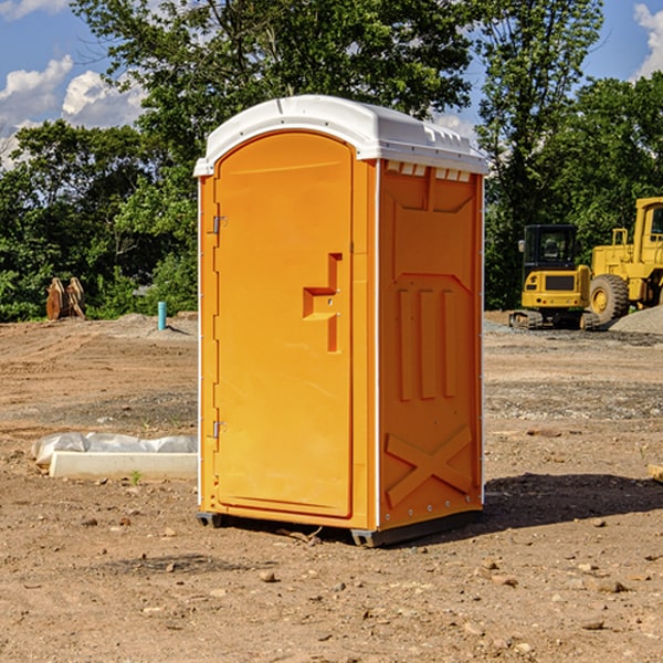 how often are the porta potties cleaned and serviced during a rental period in De Lamere